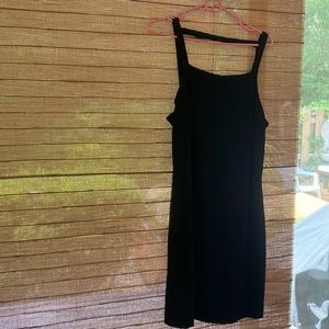 EXPRESS Tricot 92% Nylon, 6% spandex. Sz 11/12. Black sleeveless w/clever strap.